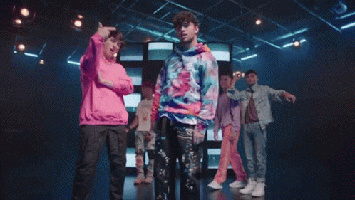 Man In Tie Dye Sweatshirt Dancing With Man In Pink Sweatshirt GIF