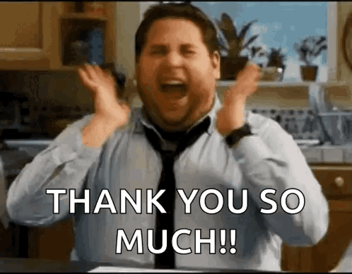 Man in Tie Making Thank You Gesture