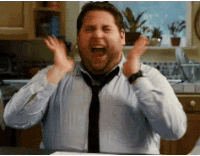 Man in Tie Surprised in Kitchen