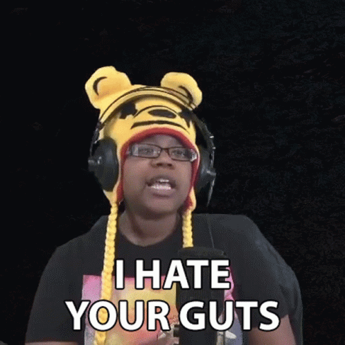 Man in Tiger Hat and Headphones Says I Hate Your Guts
