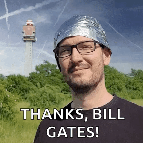 Man in Tin Foil Hat Saying Thanks Bill Gates