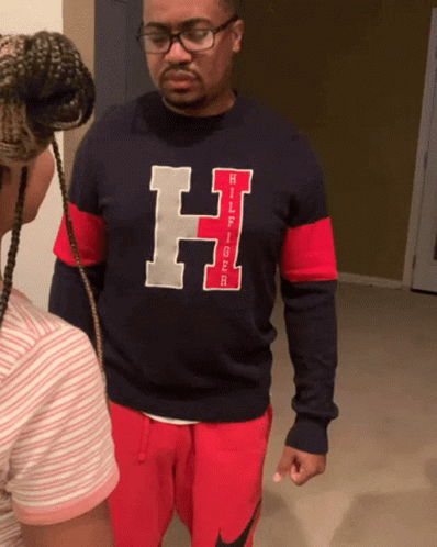 Man in Tommy Hilfiger Shirt Next to Girl