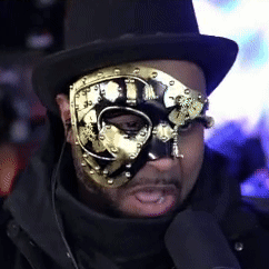 Man in Top Hat and Gold Mask
