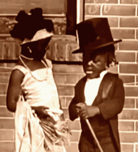 Man in Top Hat and Woman in White Dress