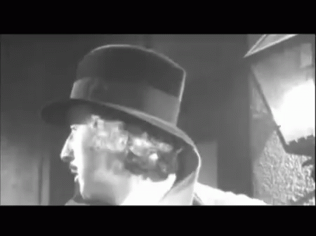 Man In Top Hat Smoking GIF
