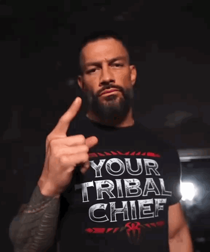 Man in Tribal Chief Shirt Giving Middle Finger