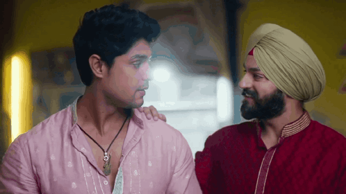 Man In Turban Talking To Another Man GIF