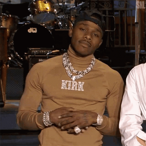 Man In Turtleneck With Necklace Saying Kirk GIF