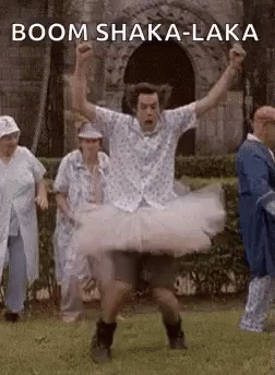 Man in Tutu Dancing in Park