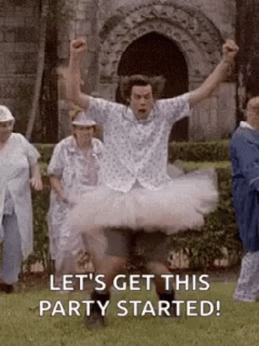 Man in Tutu Jumping in Air
