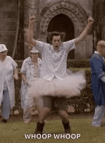 Man in Tutu Jumping While Dancing