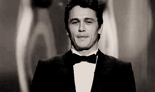 Man In Tuxedo And Bow Tie Smiling GIF