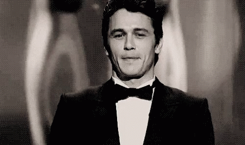 Man in Tuxedo and Bow Tie Smiling