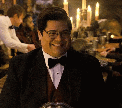 Man in Tuxedo and Bow Tie Smiling