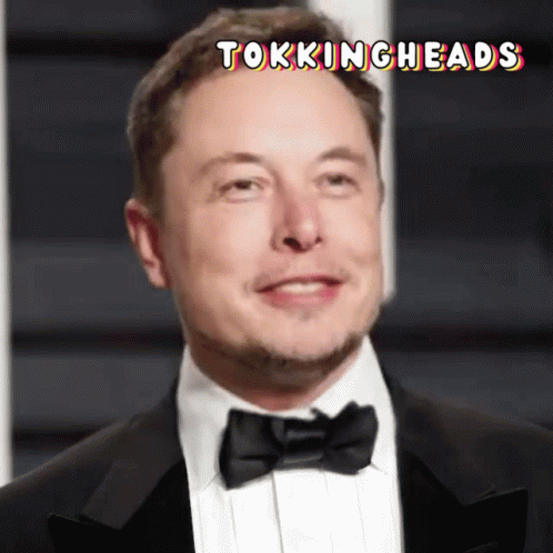 Man in Tuxedo and Bow Tie Smiling Tokingheads