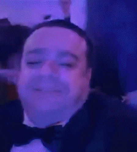 Man in Tuxedo and Bow Tie Smiling