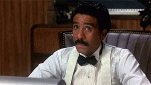 Man in Tuxedo and Bow Tie Surprised