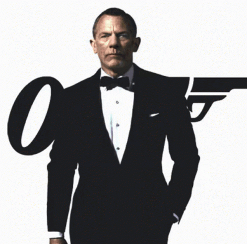 Man in Tuxedo and Bow Tie with Large O