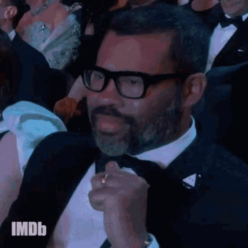 Man in Tuxedo and Glasses at Event