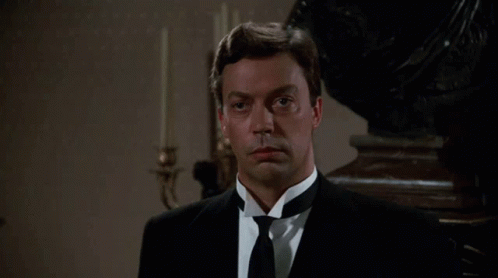 Man in Tuxedo and Tie Looking at Camera