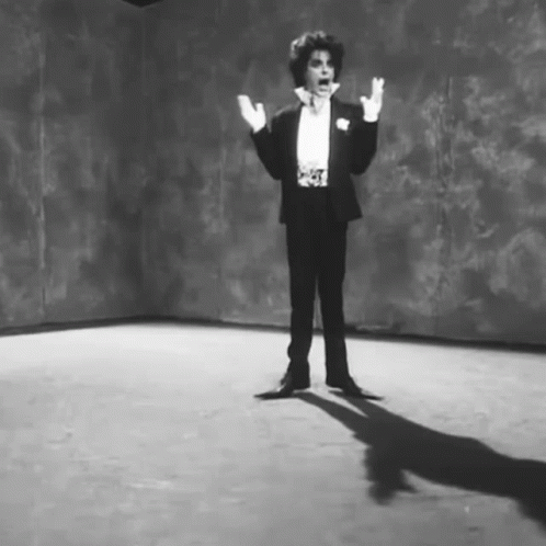 Man in Tuxedo and White Gloves