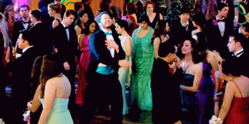 Man in Tuxedo Dancing at Prom