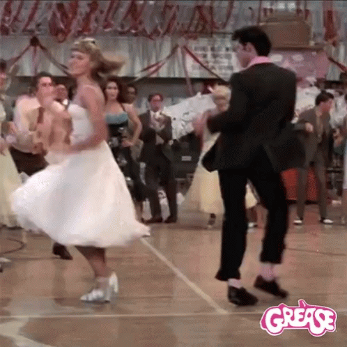 Man in Tuxedo Dancing at Prom