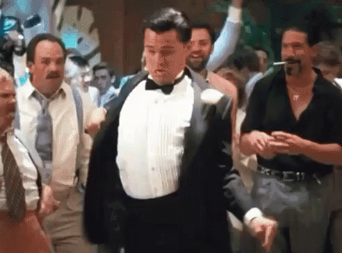 Man In Tuxedo Dancing In Crowd GIF
