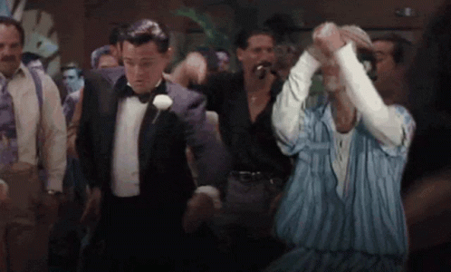 Man In Tuxedo Dancing With Man In Striped Shirt GIF