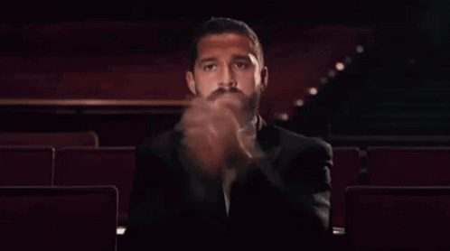 Man in Tuxedo Giving Thumbs Up