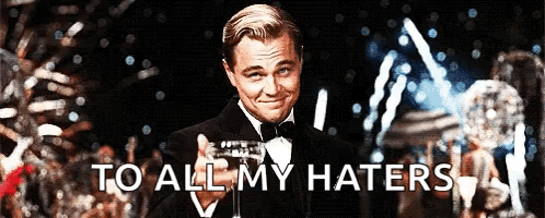 Man in Tuxedo Holding Champagne To All My Haters
