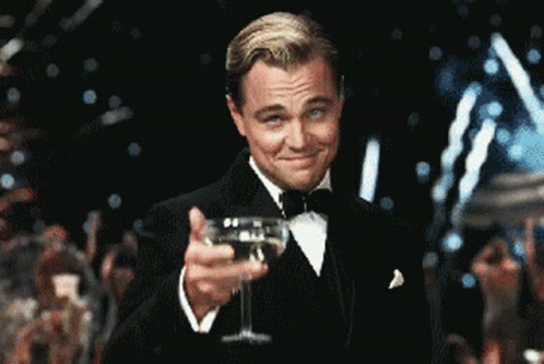 Man in Tuxedo Holding Champagne