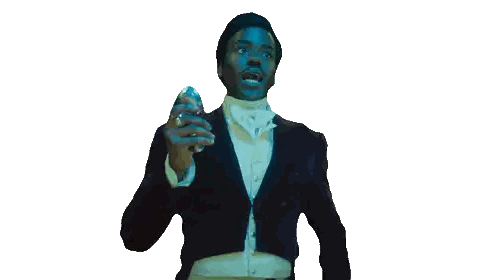 Man in Tuxedo Holding Glass