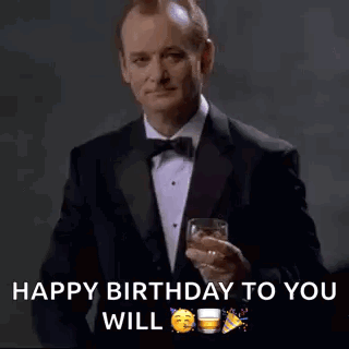 Man in Tuxedo Holding Whiskey