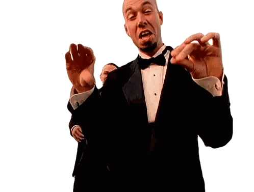 Man in Tuxedo Making Face