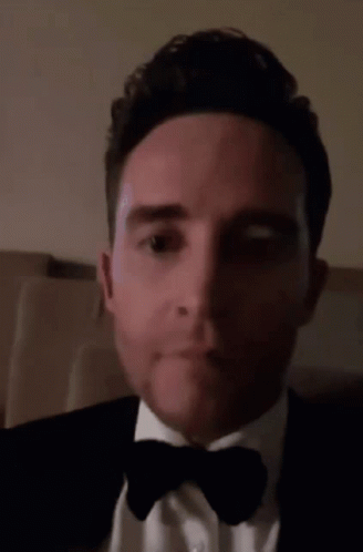 Man in Tuxedo Making Funny Face