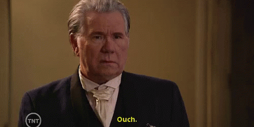 Man in Tuxedo Ouch TNT Ad