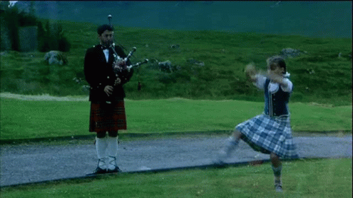 Man in Tuxedo Playing Bagpipe