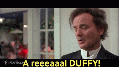 Man In Tuxedo Saying A Reeeaaal Duffy GIF
