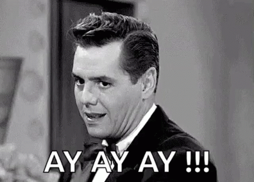 Man In Tuxedo Saying Ay Ay Ay GIF