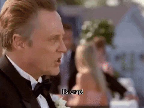Man in Tuxedo Saying It's Crap at Wedding Reception