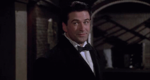 Man in Tuxedo Says I'll Know in White Letters