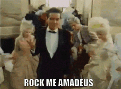 Man In Tuxedo Says Rock Me Amadeus GIF