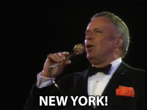 Man in Tuxedo Singing Microphone New York
