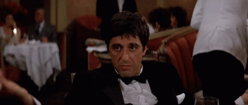 Man in Tuxedo Sitting at Table