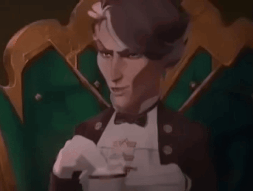 Man In Tuxedo Sitting With Coffee GIF