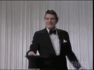 Man In Tuxedo Smiling GIF
