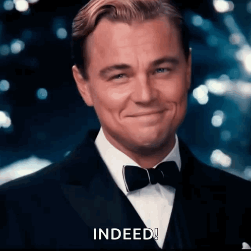 Man in Tuxedo Smiling Says Indeed