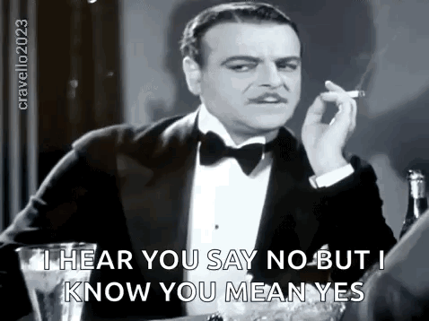 Man in Tuxedo Smoking Cigarette