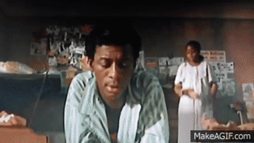 Man In Tuxedo Talking On Cell Phone Shushing GIF